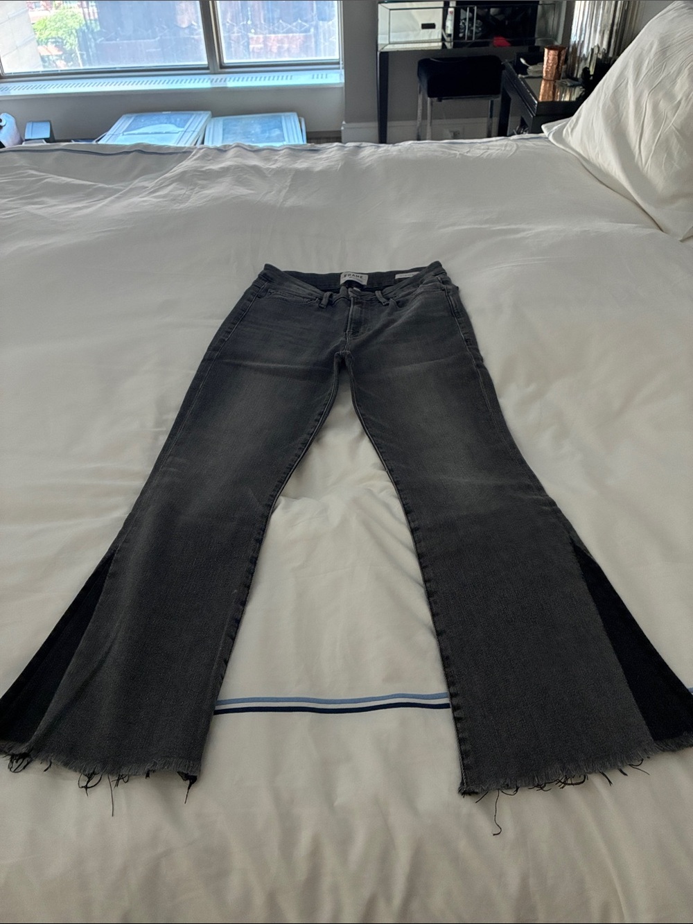 Frame Denim Black Washed Flare Jeans with Raw Hem